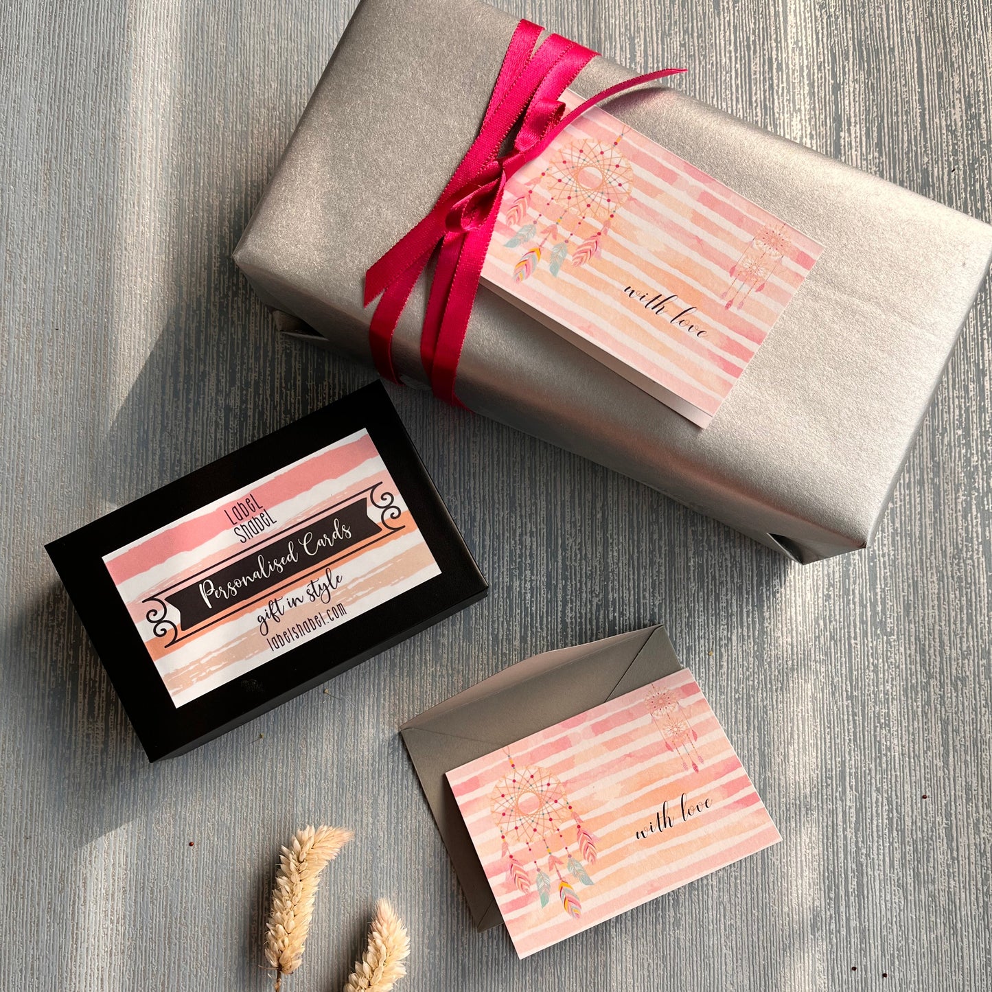 folded gift tags pink stripes with dreamcatcher design with name personalised inside on silver blue background