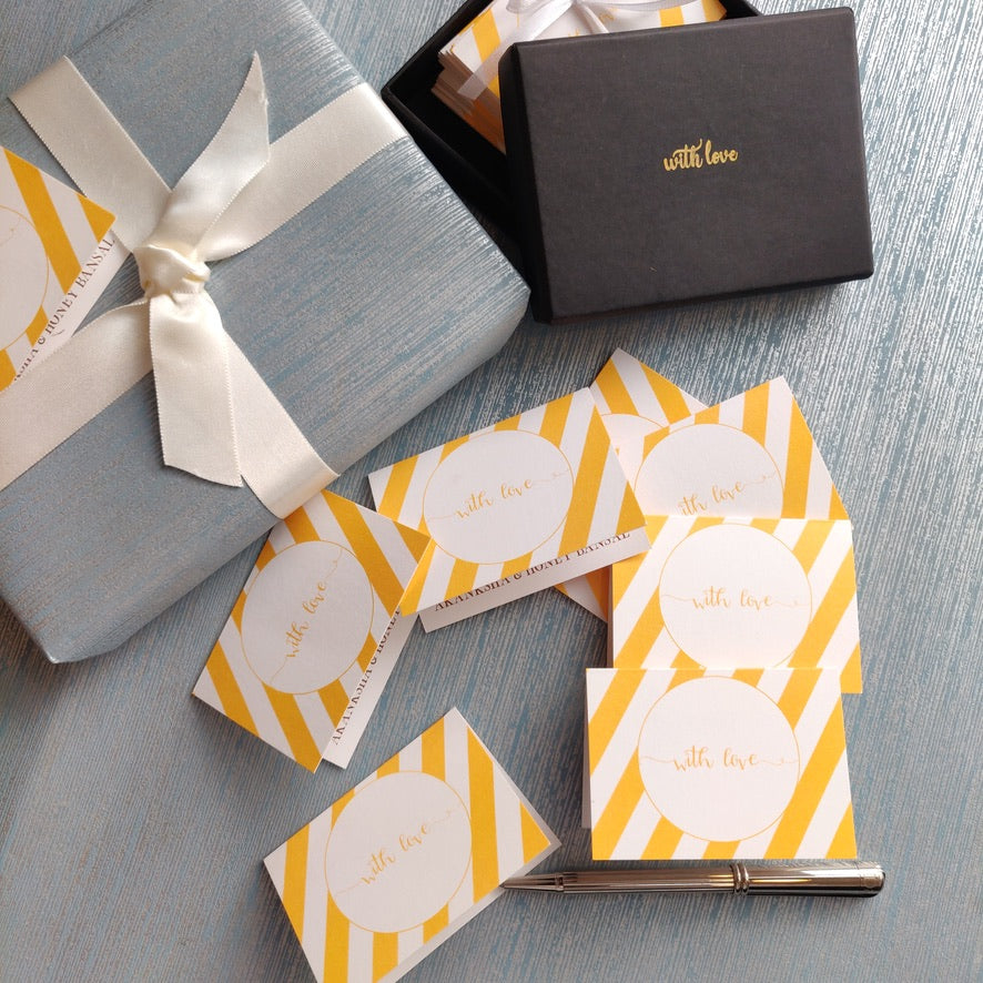 folded gift tags yellow slanted stripes with name personalised inside on silver blue background
