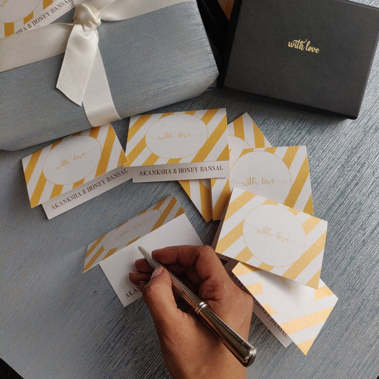 folded gift tags yellow slanted stripes with name personalised inside on silver blue background