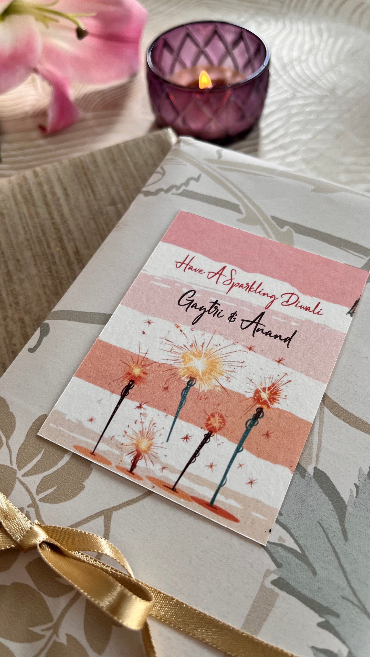 pink stripes Gift tag on a gift bearing diwali wishes