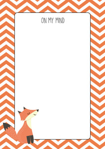 orange zigzag pattern with fox drawing note pad