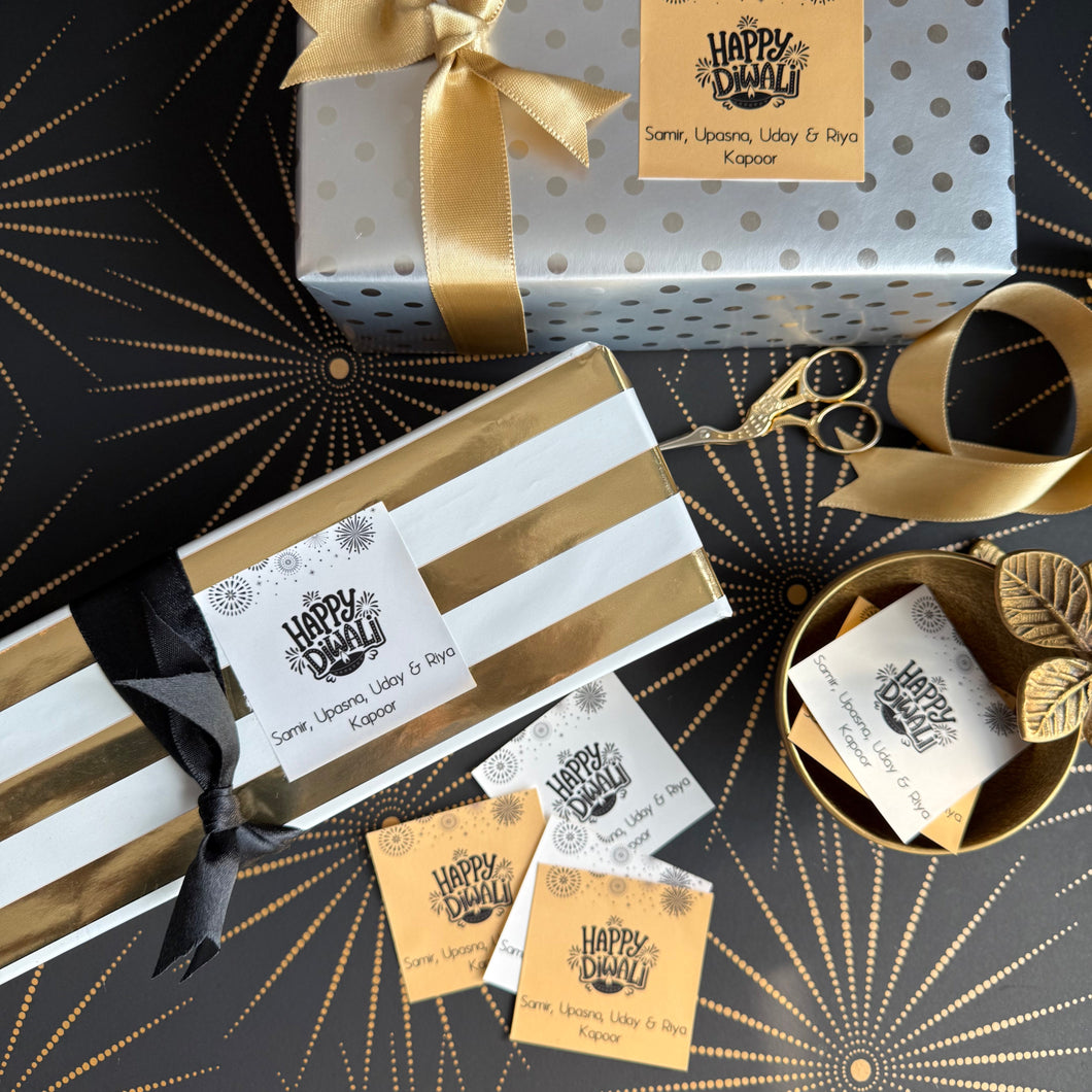 Gift boxes with ribbons and decorative tags on a patterned background
