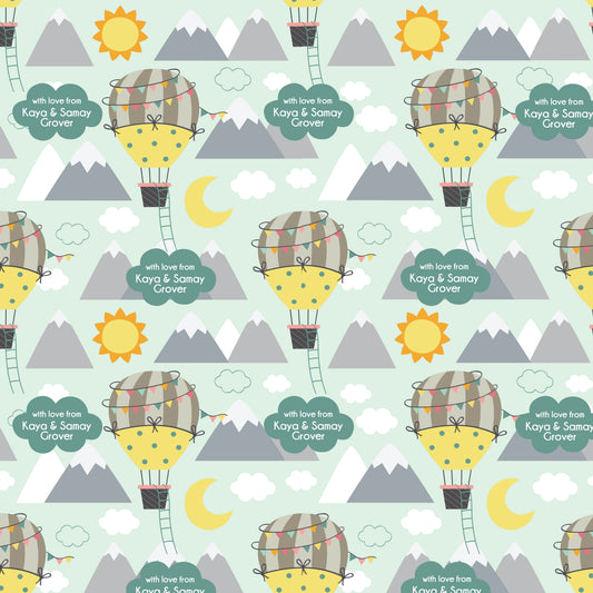 A patterned personalised wrapping paper with an airborne theme, featuring a hot air balloon, mountains, and sun.