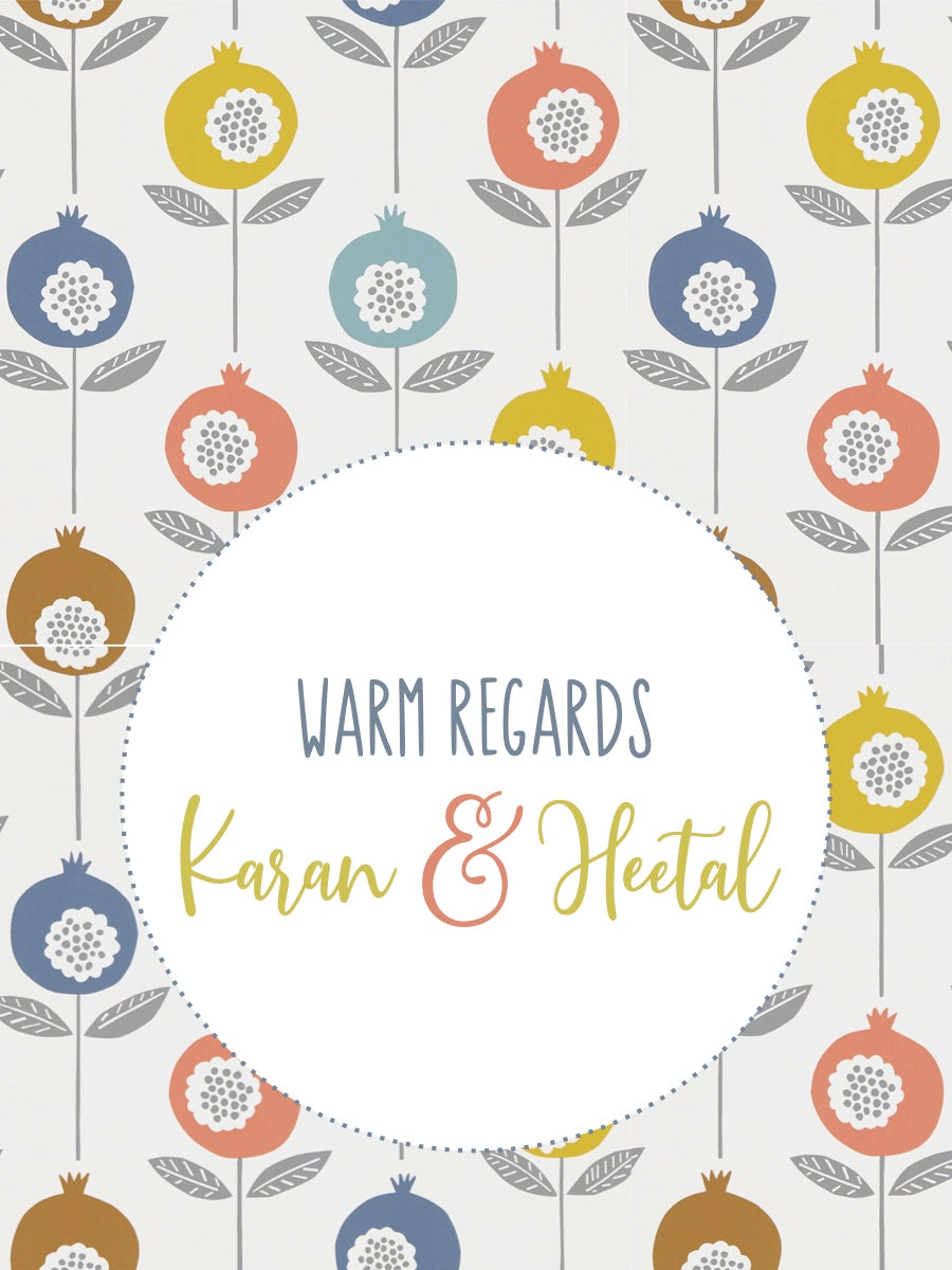 A personalized card with floral patterns and a circular text area in the center, displaying the names. The card has a white background and the text area is highlighted with a floral patterned border.