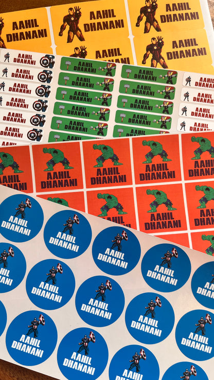 Waterproof personalised school name stickers with different avengers character illustrations and circular, rectangular, and square sticker designs in blue, green, orange, and yellow.