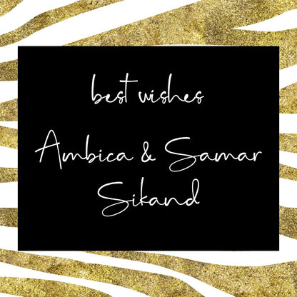 A square black card or sign with white cursive text reading 'best wishes Ambica & Samar Sikand,' centered on a gold glitter and white zebra-stripe background.