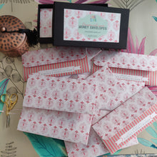 pastel hues with a damask motif in money envelope design