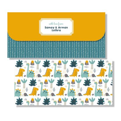 A personalized dinosaur-themed gift card and matching envelope set. The top envelope is mustard yellow with a white label reading 'with love from Samay & Arman Luthra' over a teal patterned lower half.