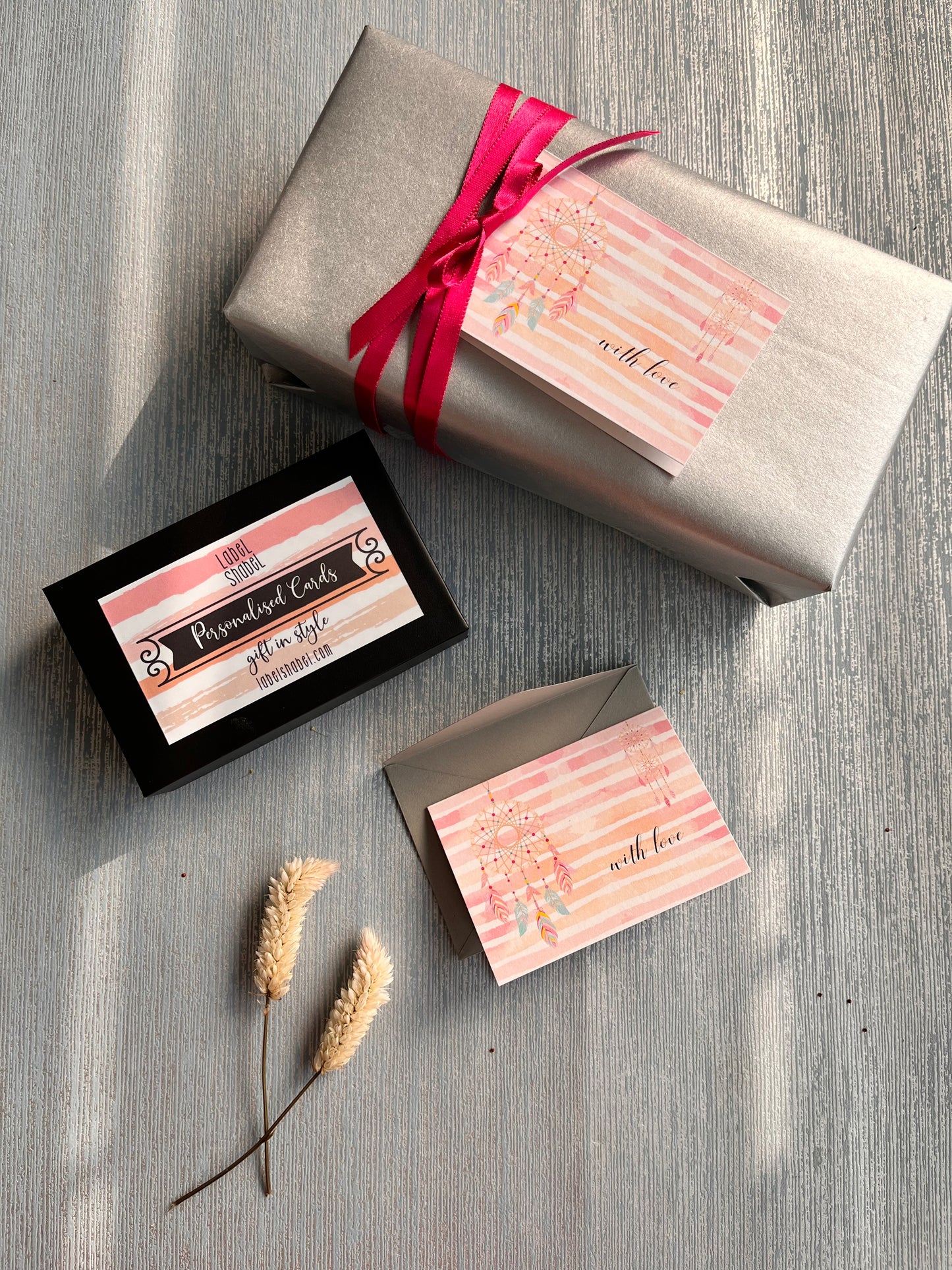 folded gift tags pink stripes with dreamcatcher design with name personalised inside on silver blue background 