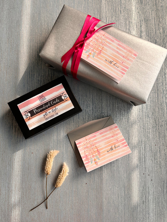 folded gift tags pink stripes with dreamcatcher design with name personalised inside on silver blue background 