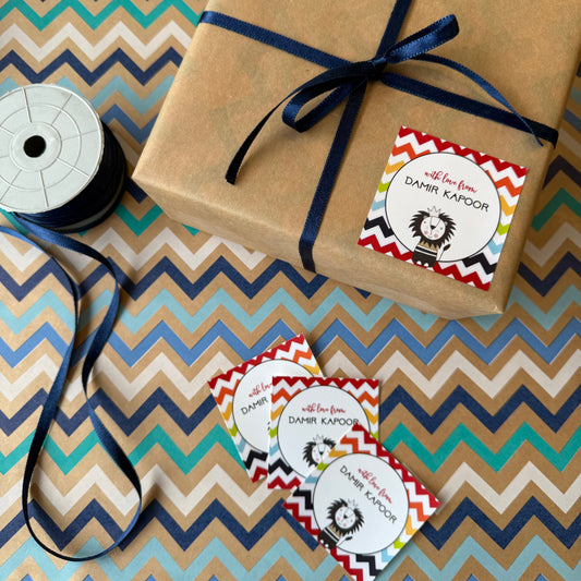 Gift wrapped in brown paper with blue ribbon on a zigzag patterned surface with a cute lion illustration