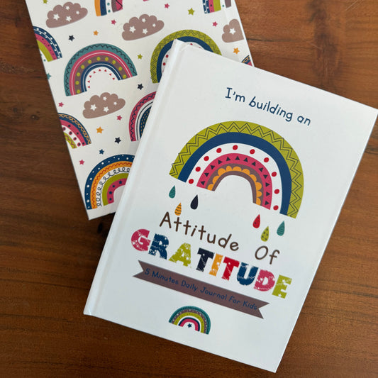 Gratitude journal front cover with a colourful rainbow and back view with multiple rainbows