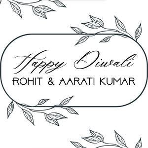 Black and white 'Happy Diwali' card with leaf decorations and personalized names.