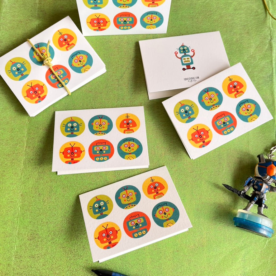 folded gift tags with robot cartoon faces in circles design with name personalised inside 