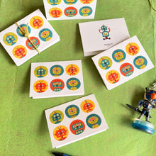 folded gift tags with robot cartoon faces in circles design with name personalised inside 