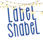 Label shabel logo in blue with a string of fairy lights around it for diwali