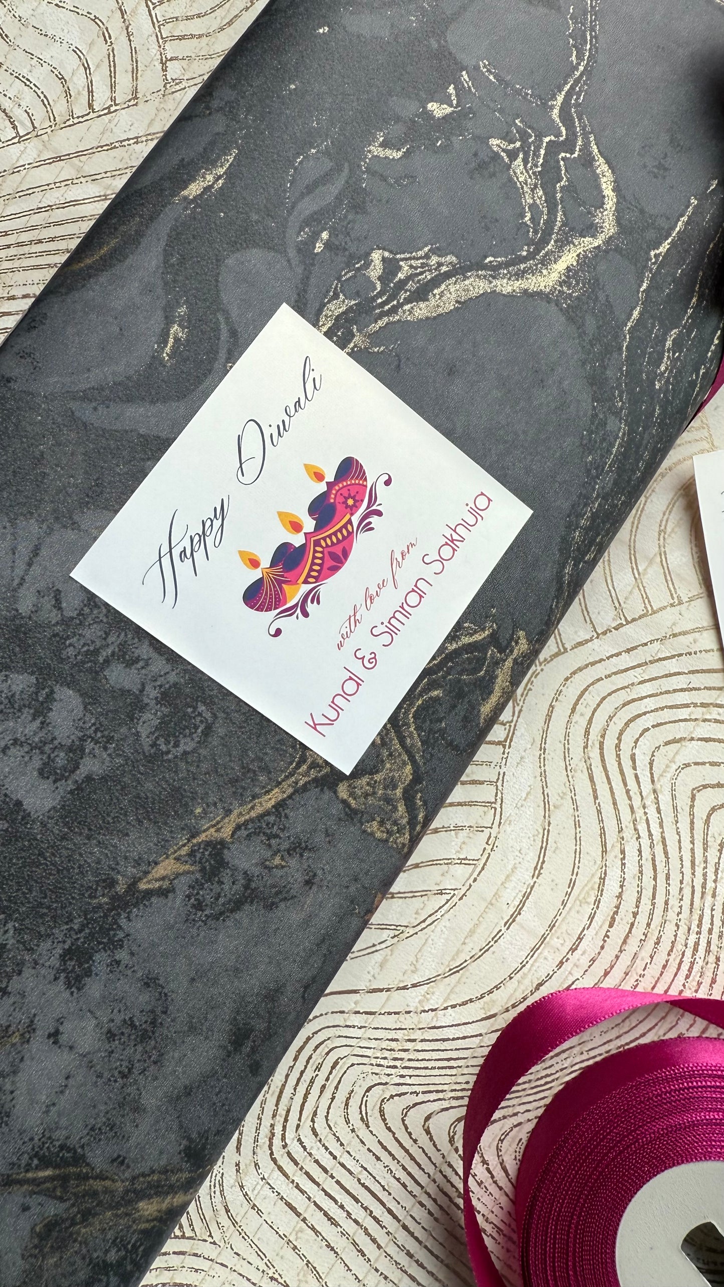 Greeting card with a colorful design on a marble surface