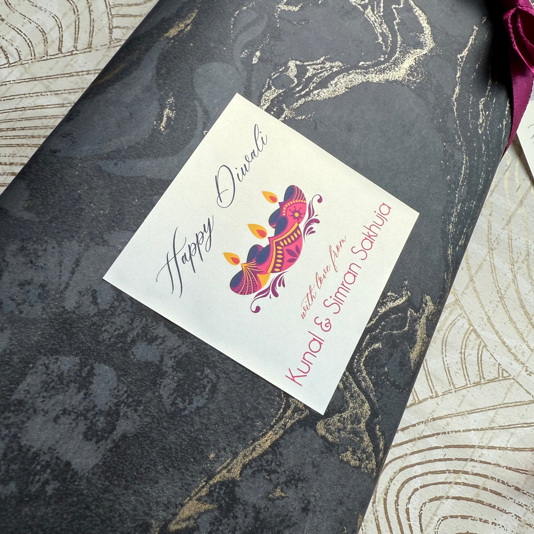 Greeting card with 'Happy Diwali' design on a decorative surface