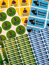Collection of name labels with lego avengers characters printed on them, in various colors and shapes.
