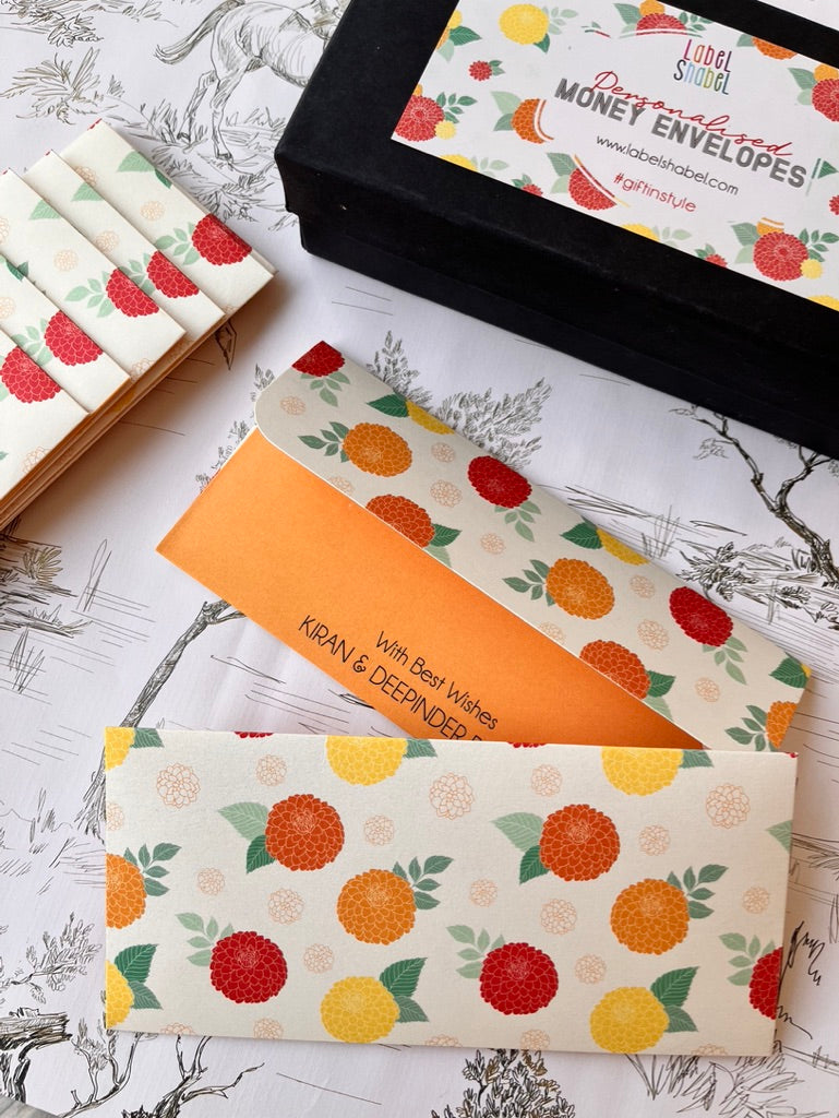 Perosnalised money envelopes with marigold flowers in orange, yellow and deep red