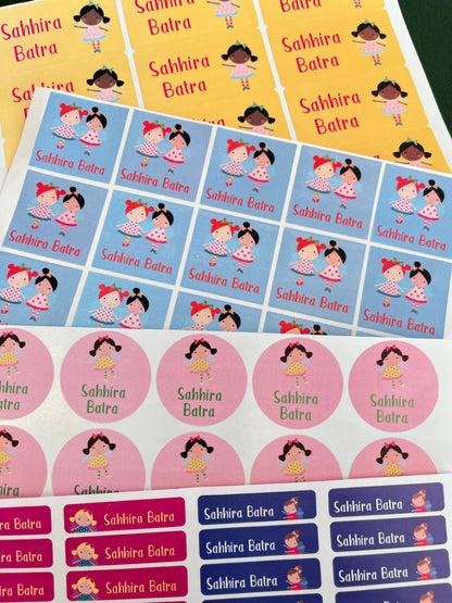 A sheet of colorful round stickers and rectangular labels featuring cartoon girl illustrations in multiple colorways, arranged on a white background.