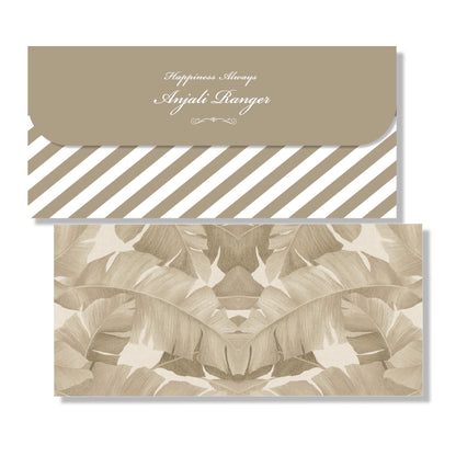 A stack of beige colored envelopes with a floral pattern and text detailing.