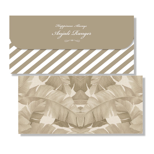 A stack of beige colored envelopes with a floral pattern and text detailing.
