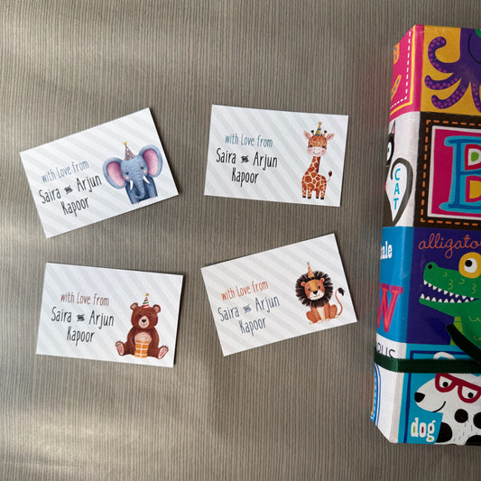 Set of 4 gift cards for kids with cute animals in party hats on striped grey background 