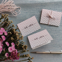 folded gift tags pink and grey chevron design with name personalised inside on silver blue background with pink daisy flowers on left side