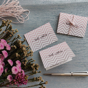folded gift tags pink and grey chevron design with name personalised inside on silver blue background with pink daisy flowers on left side
