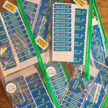 packs of name labels in green and blue as sets of returtn gifts personalised with names