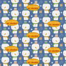 Personalised xmas wrapping paper with blue background and a snowman and snowflakes with a yellow box with names on it