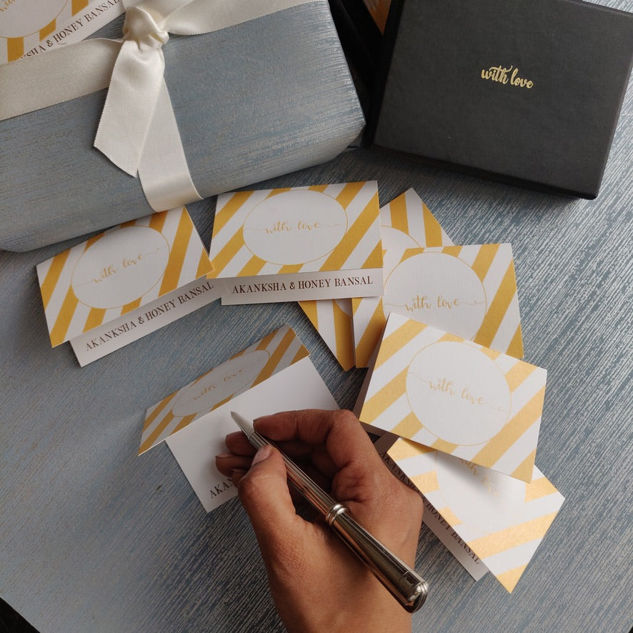 folded gift tags yellow slanted stripes with name personalised inside on silver blue background 