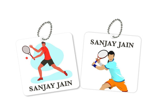 Two square metal bag tags with a tennis theme. One tag features an illustration of a male tennis player in action, and the other tag features an illustration of a female tennis player.