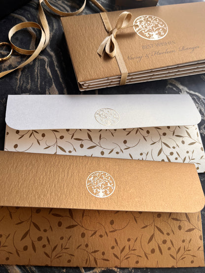 Tree Of Life themed envelopes back design with metal motif on flap in a gold paper and a cream paper