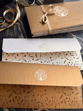 Tree Of Life themed envelopes back design with metal motif on flap in a gold paper and a cream paper