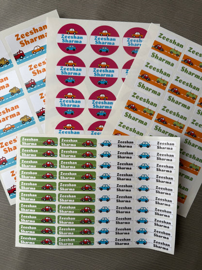Customizable waterproof school  name stickers featuring the name 'Zeeshan Sharma' with small car illustrations, shown in multiple sheets with pink, green, blue, and orange accents.