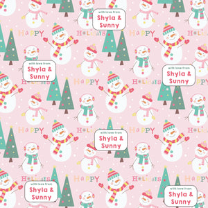 cute snowmen surrounded by xmas trees on a pastel pink background