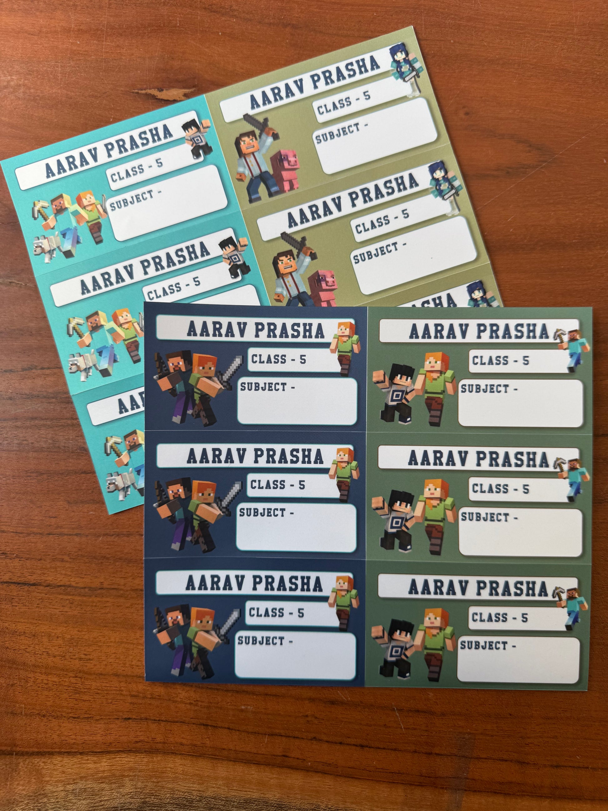 minecraft theme book labels each with a different background color (teal, olive green, navy blue, and dark green) and cartoon Minecraft-style characters.
