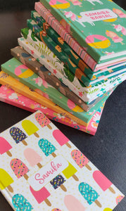 Stack of note books in  11 differnt prints