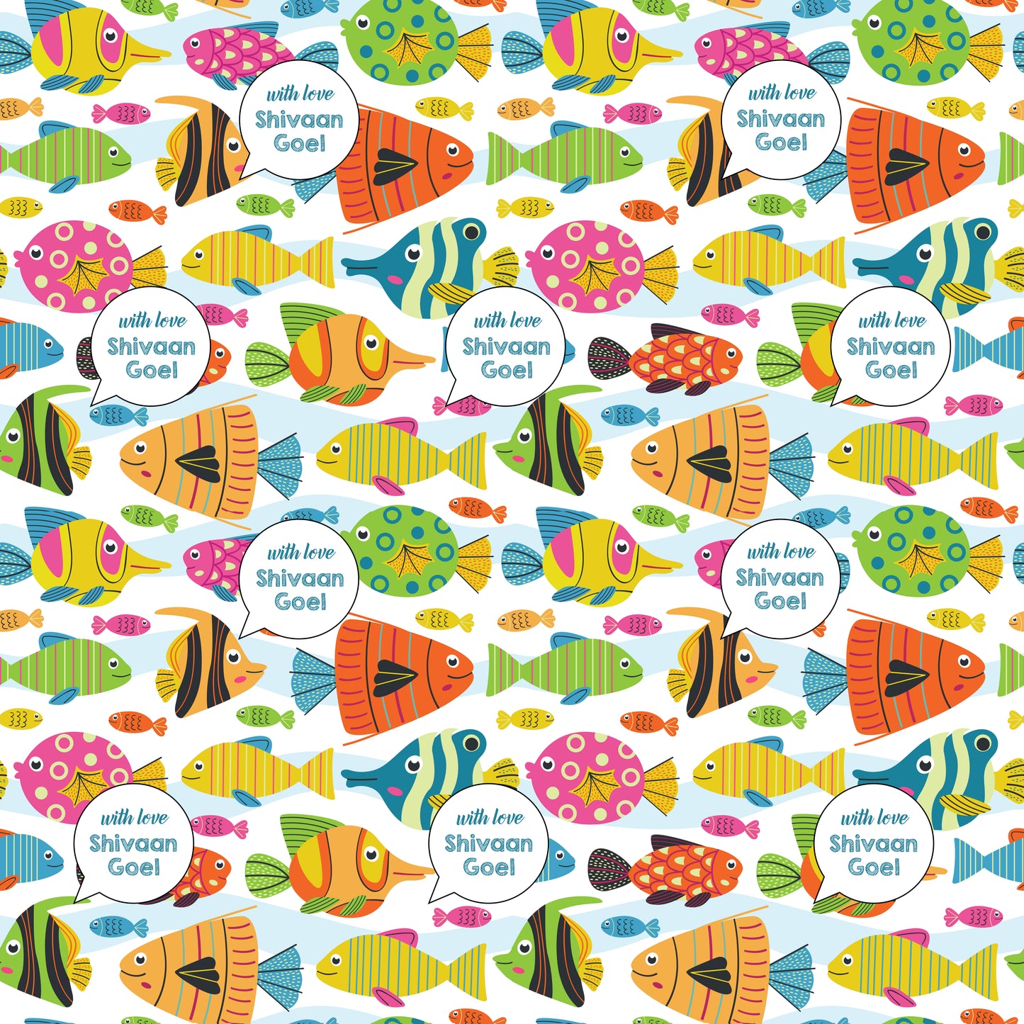 A colorful ocean-themed personalised wrapping paper with various fish and a text section for personalization.