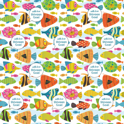 A colorful ocean-themed personalised wrapping paper with various fish and a text section for personalization.