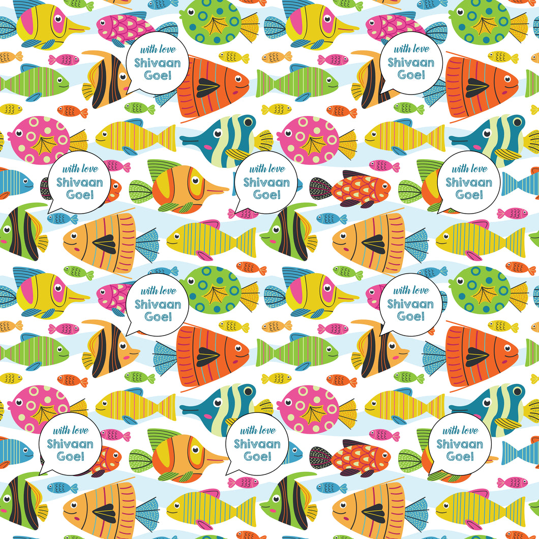A colorful ocean-themed personalised wrapping paper with various fish and a text section for personalization.