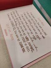 Opening page of a photobook with a message dedicated from mother to daughter a poem