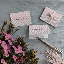 folded gift tags pink and grey chevron design with name personalised inside on silver blue background with pink daisy flowers on left side