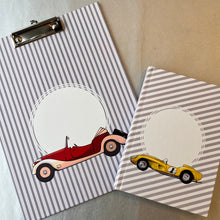Customized school set with  cars, including a notebook, a clipboard, each with personalized name 