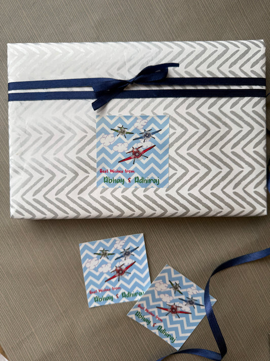 personalised gift label with airplanes on a blue white sky colour background