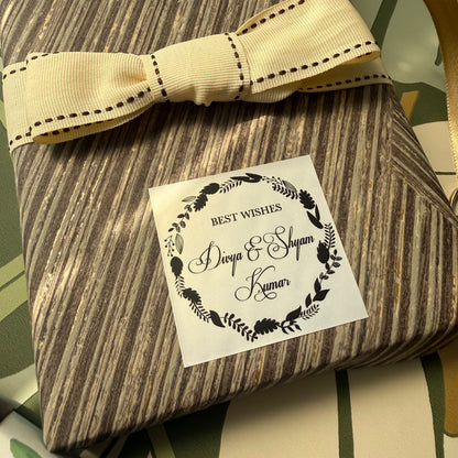 elaborate wreath design gift label with fancy cursive font