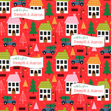 bright red xmas personalised wrapping paper featuring houses a car with a xmas tree on it personalised with a name