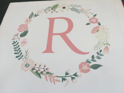 monogram  R with wreath 
